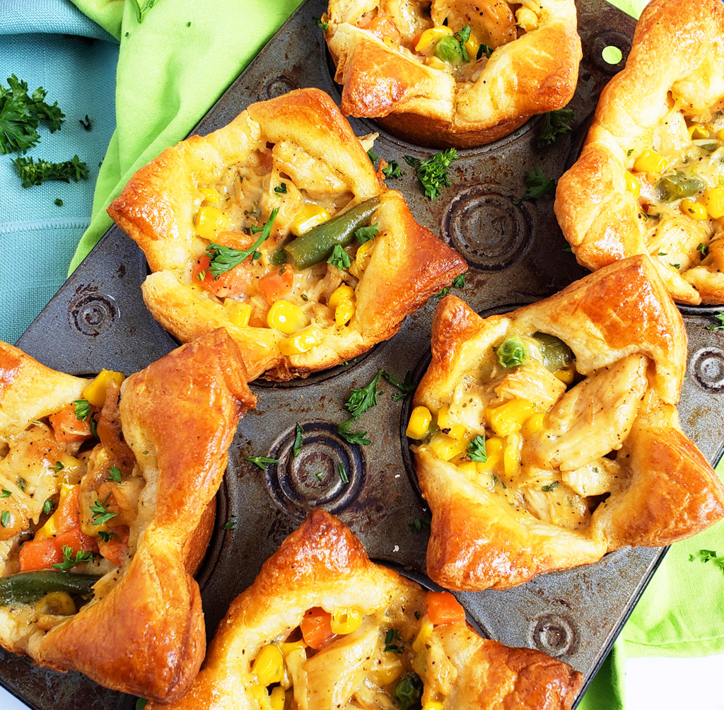 5-Ingredient Mini Chicken Ranch Pot Pies made with Pillsbury crescent dough in muffin tins