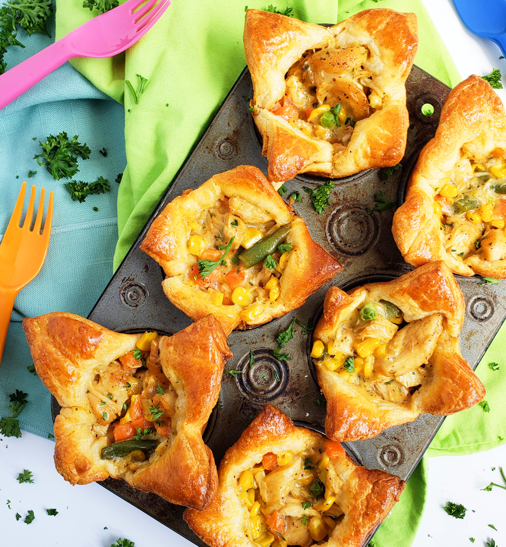 5-Ingredient Mini Chicken Ranch Pot Pies made with Pillsbury crescent dough in muffin tins