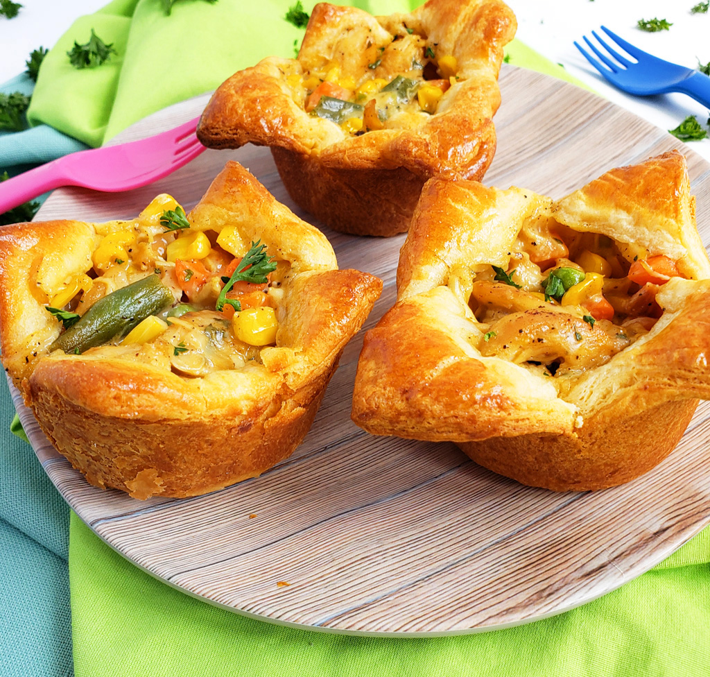 5-Ingredient Mini Chicken Ranch Pot Pies made with Pillsbury crescent dough in muffin tins