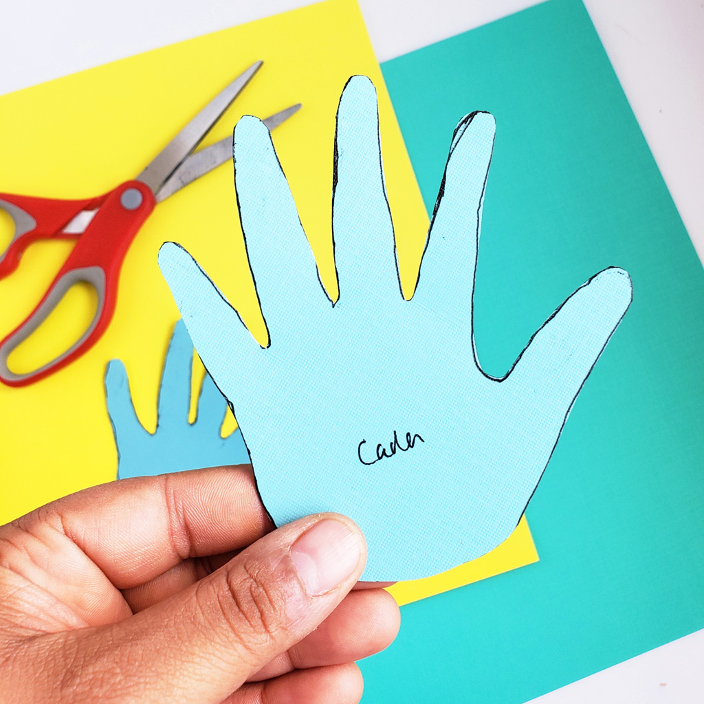 Easy DIY Thanksgiving Cards made with hand prints and stickers on colored craft paper. Perfect for teachers and parents. #thanksgivingcrafts #diythanksgiving