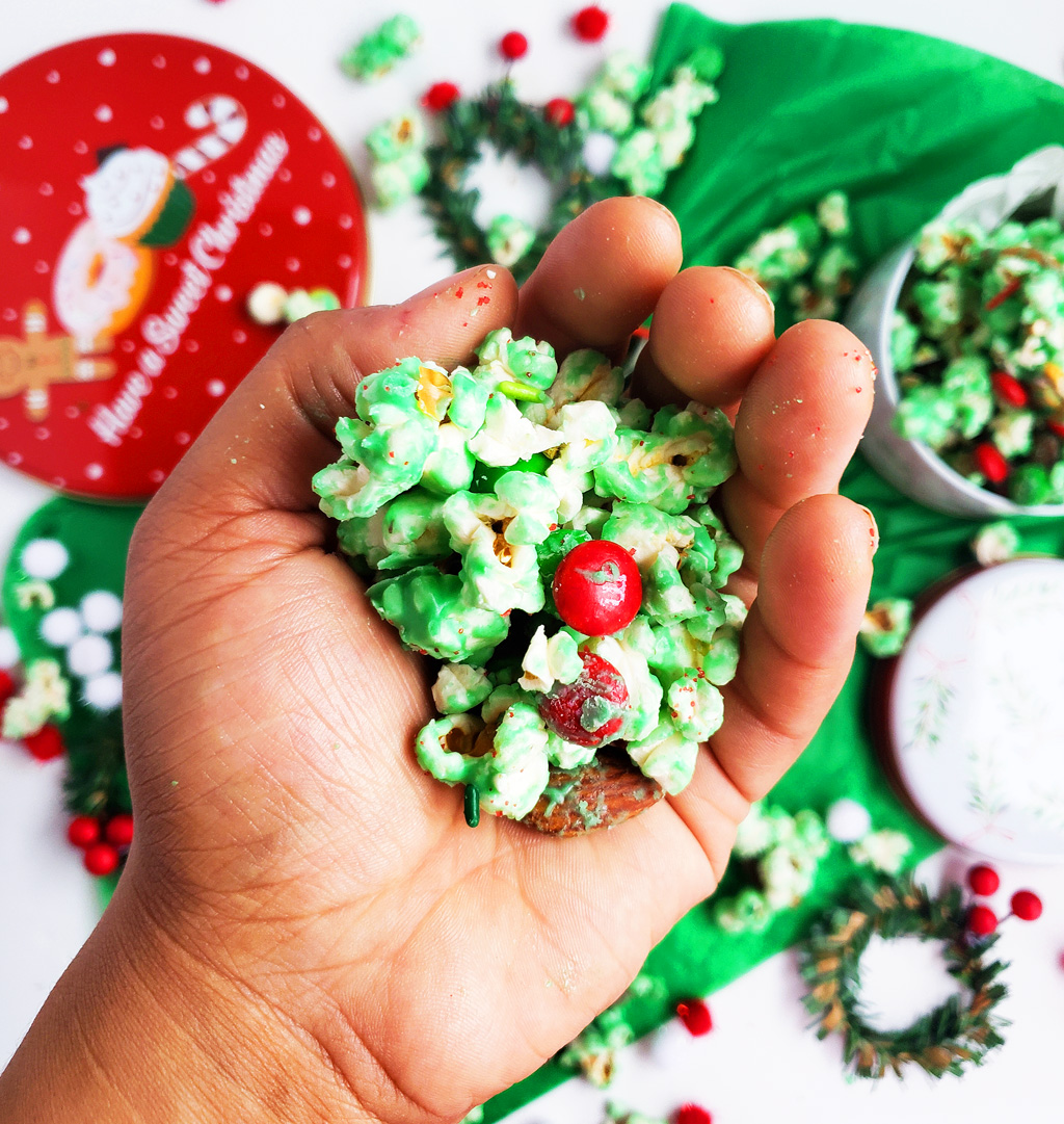 Easy Holiday Grinch Mix made with green white chocolate, almonds, pretzels, and M&Ms