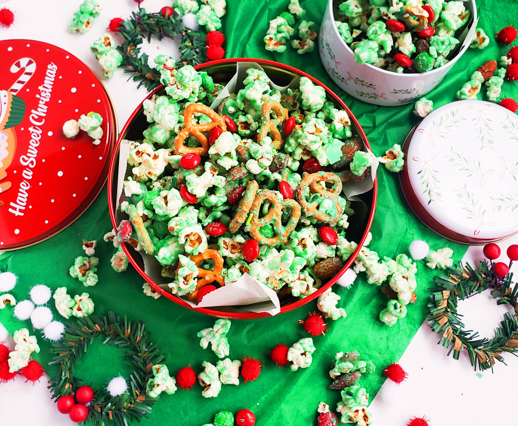 Easy Holiday Grinch Mix made with green white chocolate, almonds, pretzels, and M&Ms