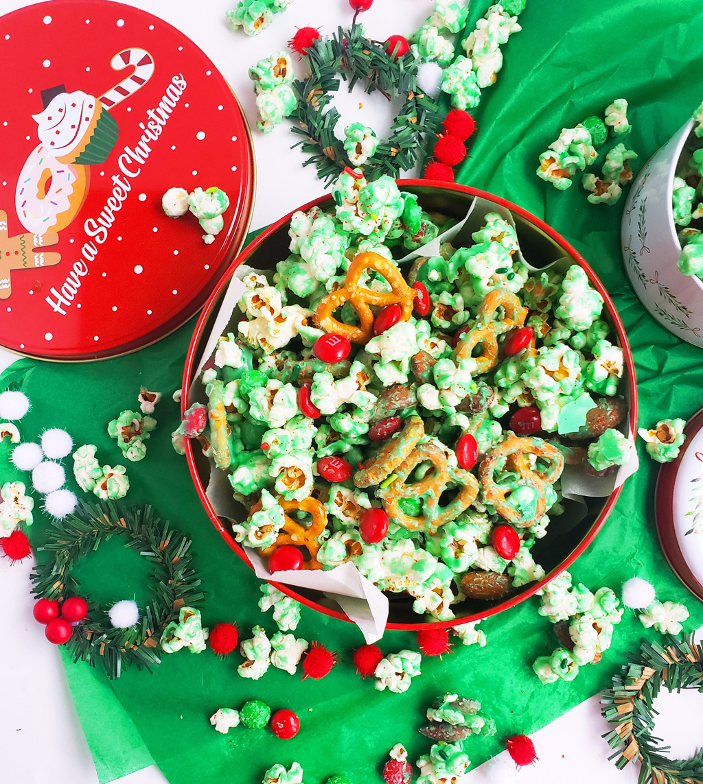 Easy Holiday Grinch Mix made with green white chocolate, almonds, pretzels, and M&Ms