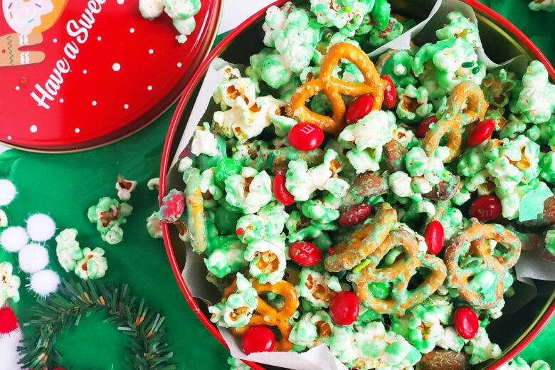 Easy Holiday Grinch Mix made with green white chocolate, almonds, pretzels, and M&Ms