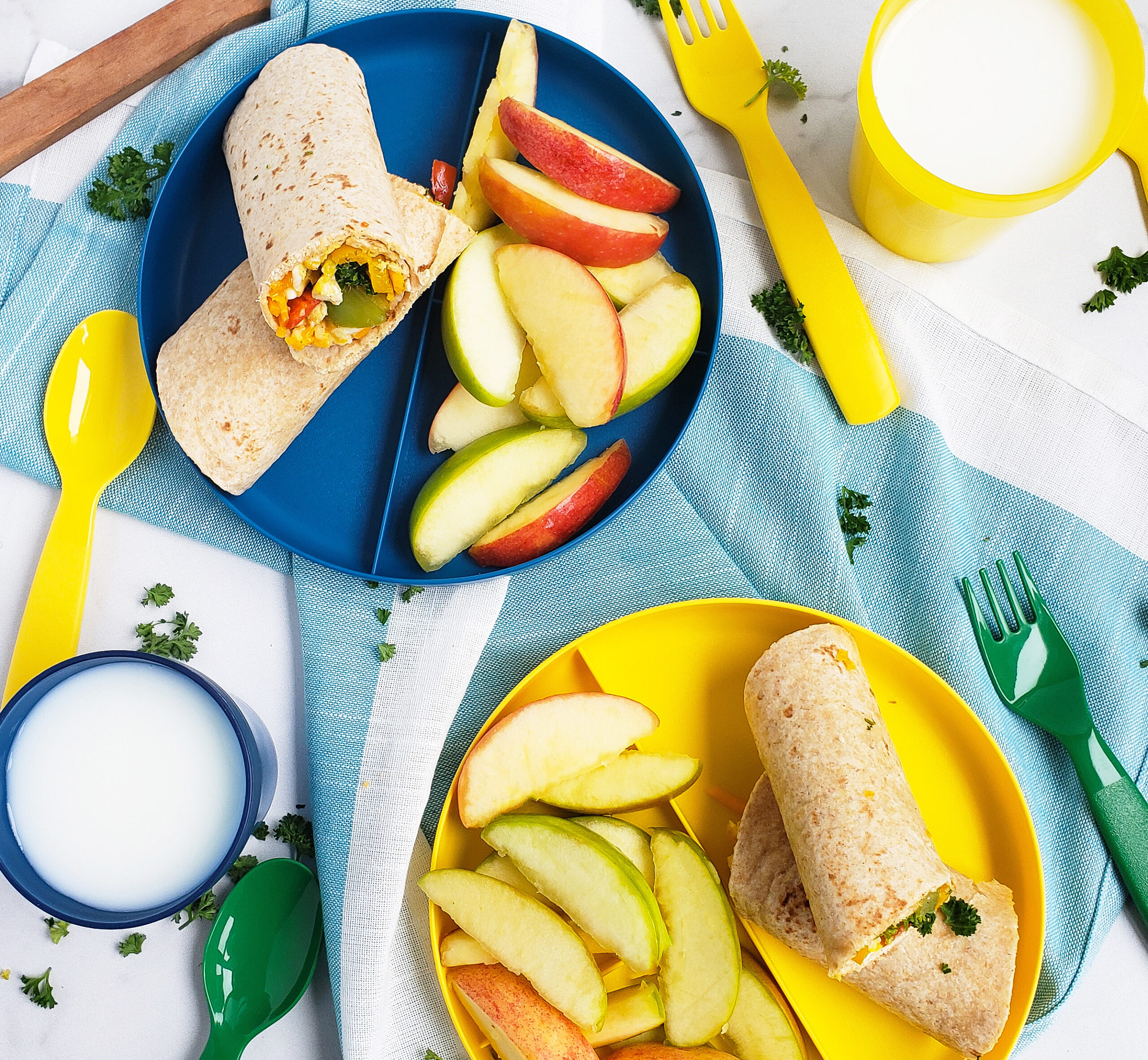 Cheesy Veggie & Egg Breakfast Roll-Ups, the perfect kid-approved, toddler-approved meal. #healthykids #kidsinthekitchen #breakfastwraps