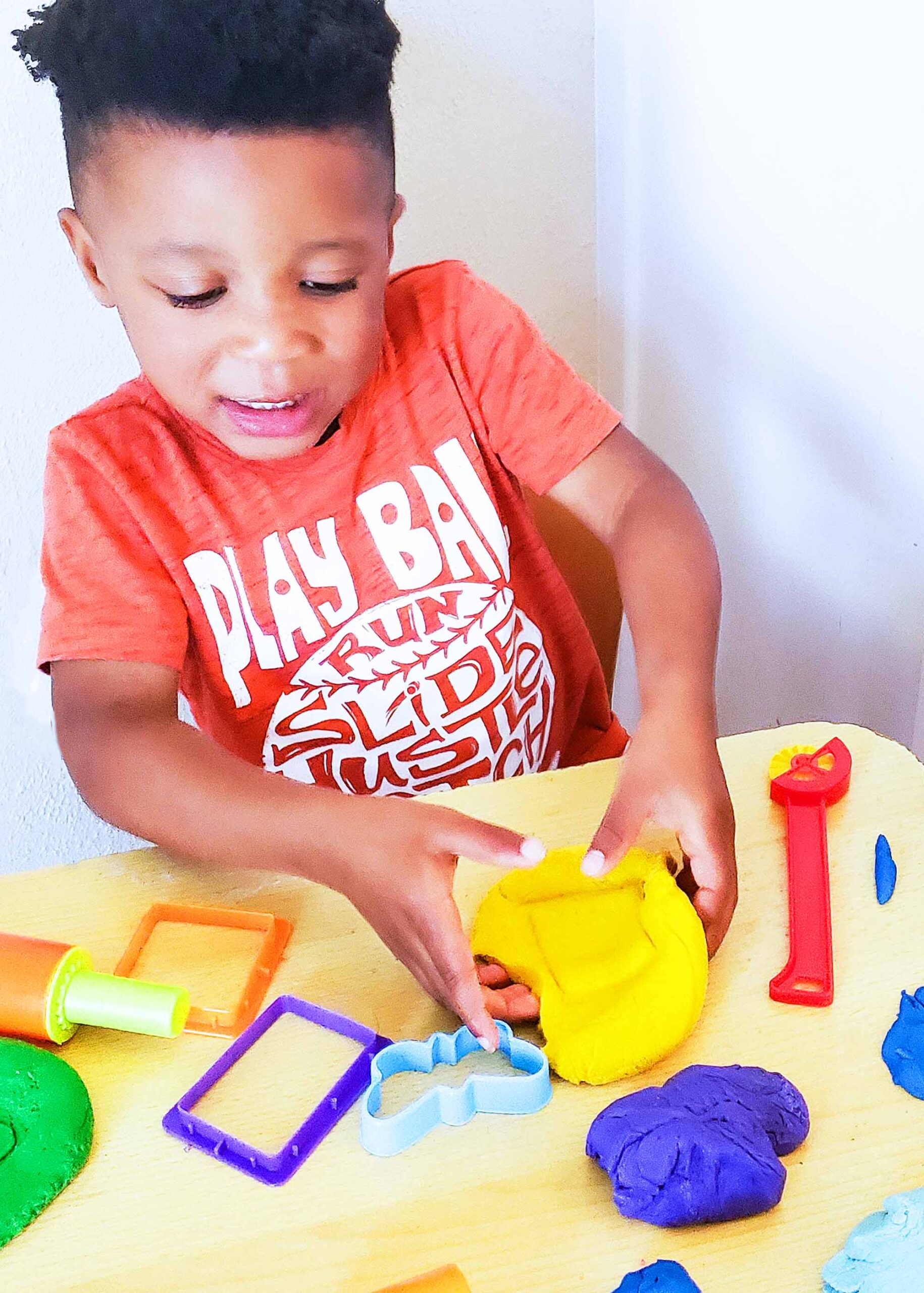 Easy No-Cook DIY Playdough, made with no cream of tartar, and no cooking required. The easiest playdough recipe ever. Different color playdough and utensils. #sensoryactivities #indooractivitiesforkids #indooractivities #homemadeplaydough #playdoh