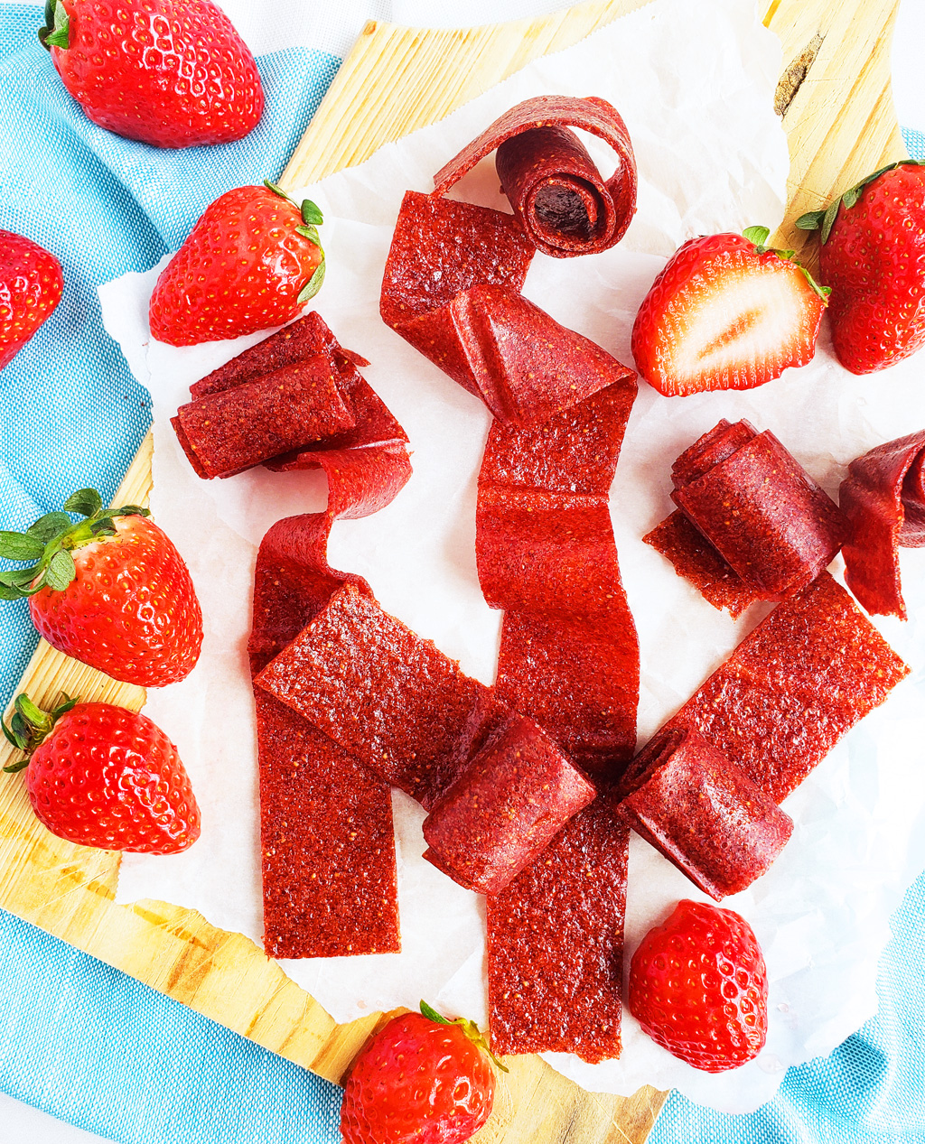 These 3-Ingredient Homemade Strawberry Fruit Roll-Ups are such an easy, healthy, and delicious way to make your very own fruit leather…. without any fancy equipment! Easy Healthy Strawberry Fruit Snacks. #fruitleather #strawberryfruitsnacks #fruitrollup #healthysnacksforkids littleeatsandthings.com 