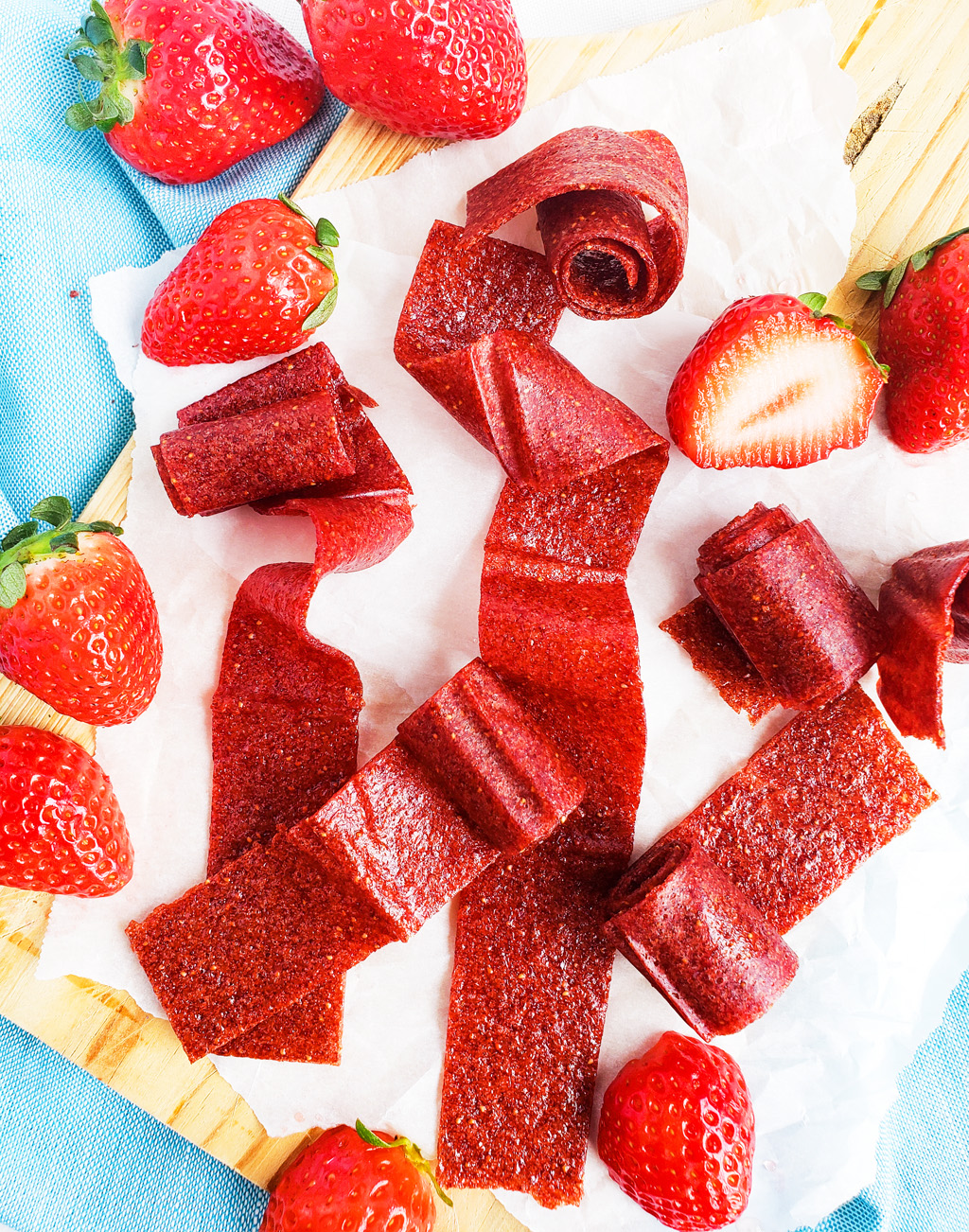 These 3-Ingredient Homemade Strawberry Fruit Roll-Ups are such an easy, healthy, and delicious way to make your very own fruit leather…. without any fancy equipment! Easy Healthy Strawberry Fruit Snacks. #fruitleather #strawberryfruitsnacks #fruitrollup #healthysnacksforkids littleeatsandthings.com 