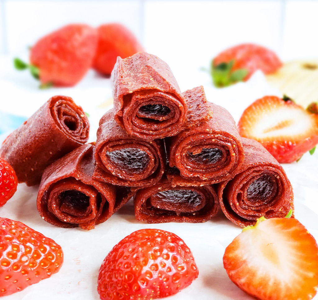 These 3-Ingredient Homemade Strawberry Fruit Roll-Ups are such an easy, healthy, and delicious way to make your very own fruit leather…. without any fancy equipment! Easy Healthy Strawberry Fruit Snacks. #fruitleather #strawberryfruitsnacks #fruitrollup #healthysnacksforkids littleeatsandthings.com