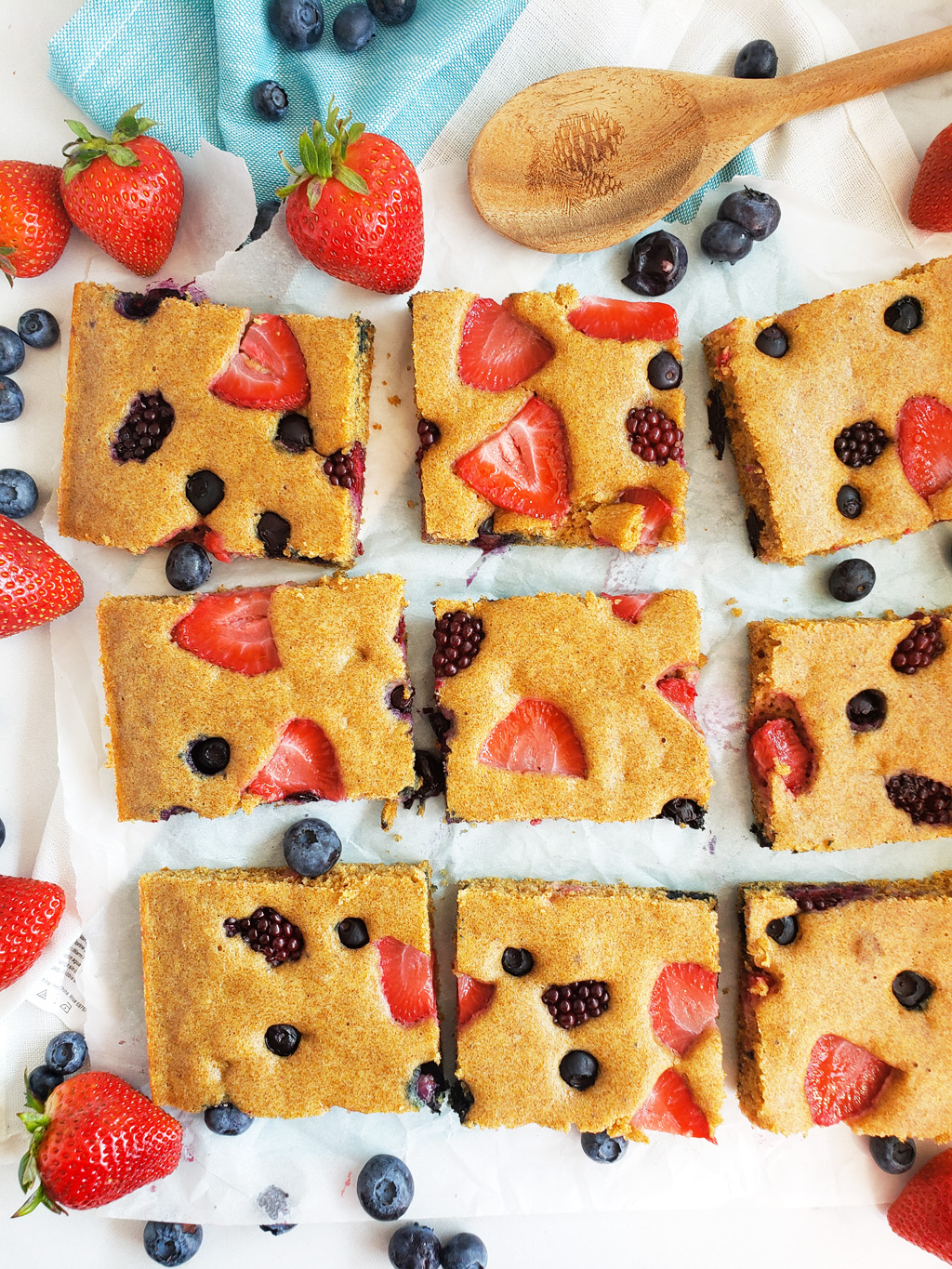 These Very Berry Sheet-Pan Pancakes are an easy, wholesome breakfast that the whole family will enjoy! Made with whole wheat flour, strawberries, blueberries, and raspberries. Littleeatsandthings.com