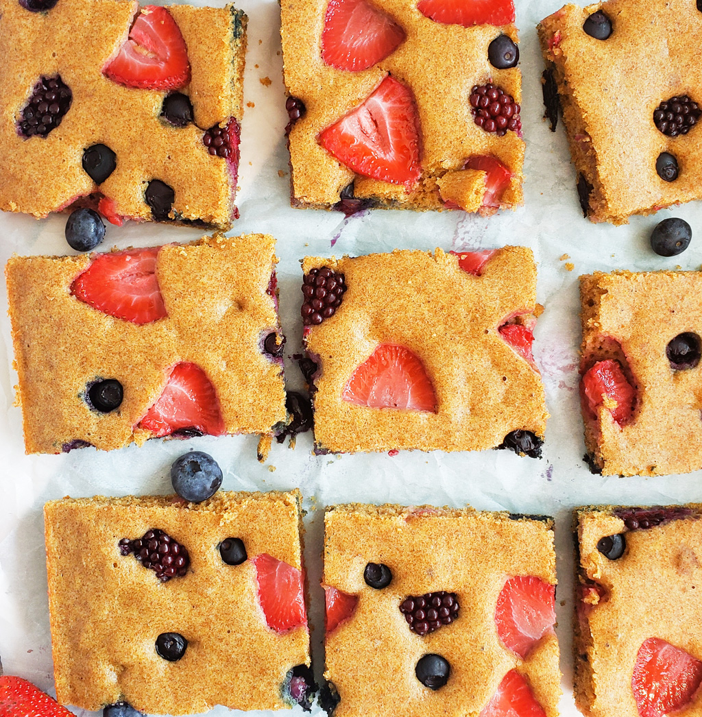 These Very Berry Sheet-Pan Pancakes are an easy, wholesome breakfast that the whole family will enjoy! Made with whole wheat flour, strawberries, blueberries, and raspberries. Littleeatsandthings.com