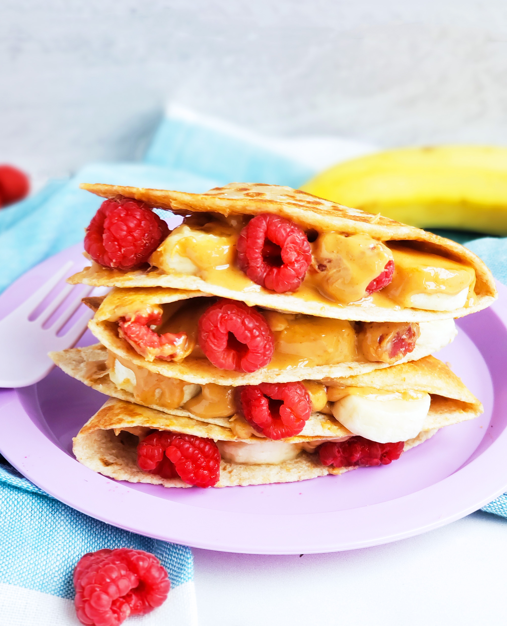 Try this delicious, stacked Raspberry, Banana, & Peanut Butter Quesadilla instead! It’s the perfect after-school snack or lunch. beautifuleatsandthings.com