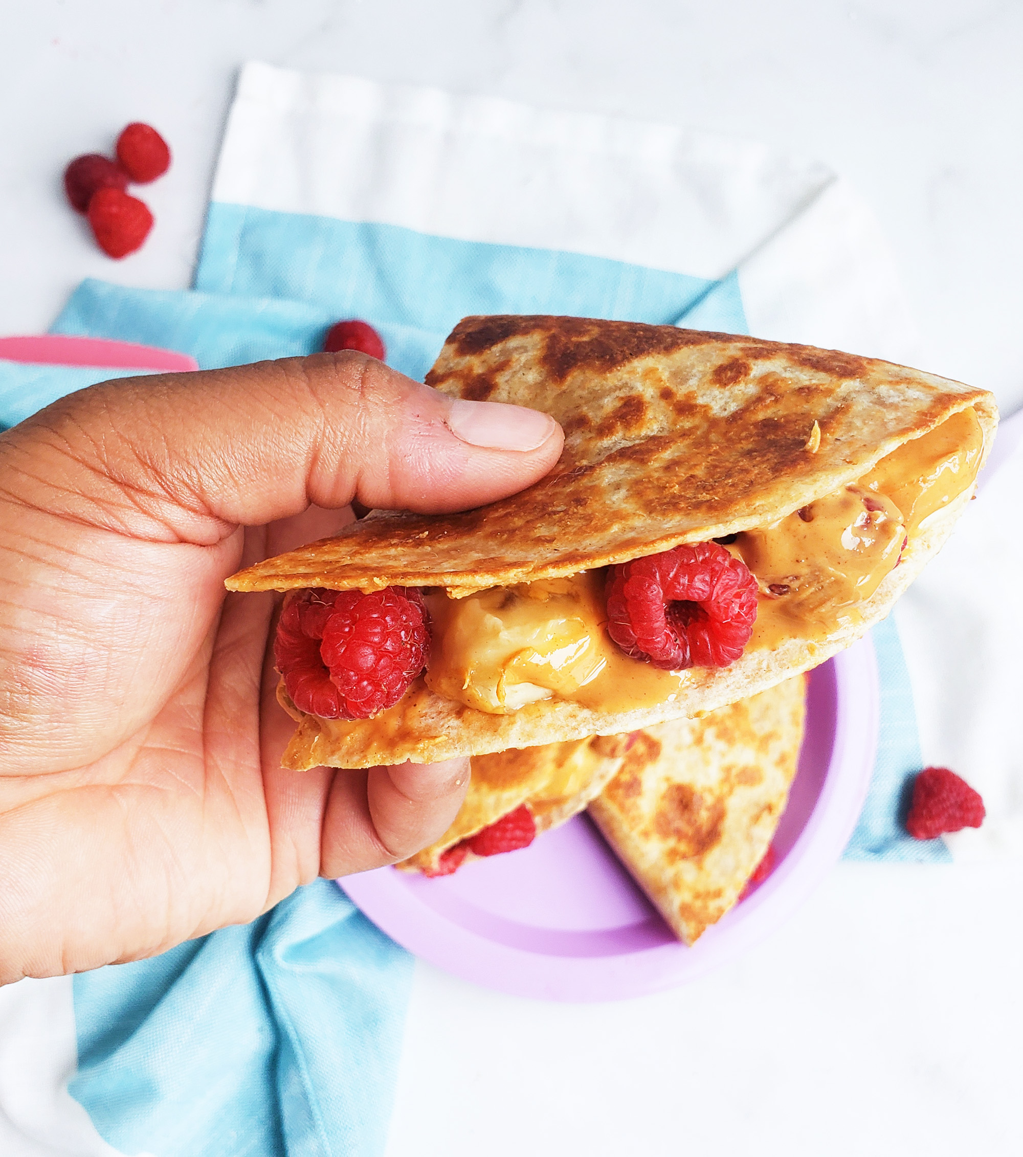 Try this delicious, stacked Raspberry, Banana, & Peanut Butter Quesadilla instead! It’s the perfect after-school snack or lunch. beautifuleatsandthings.com