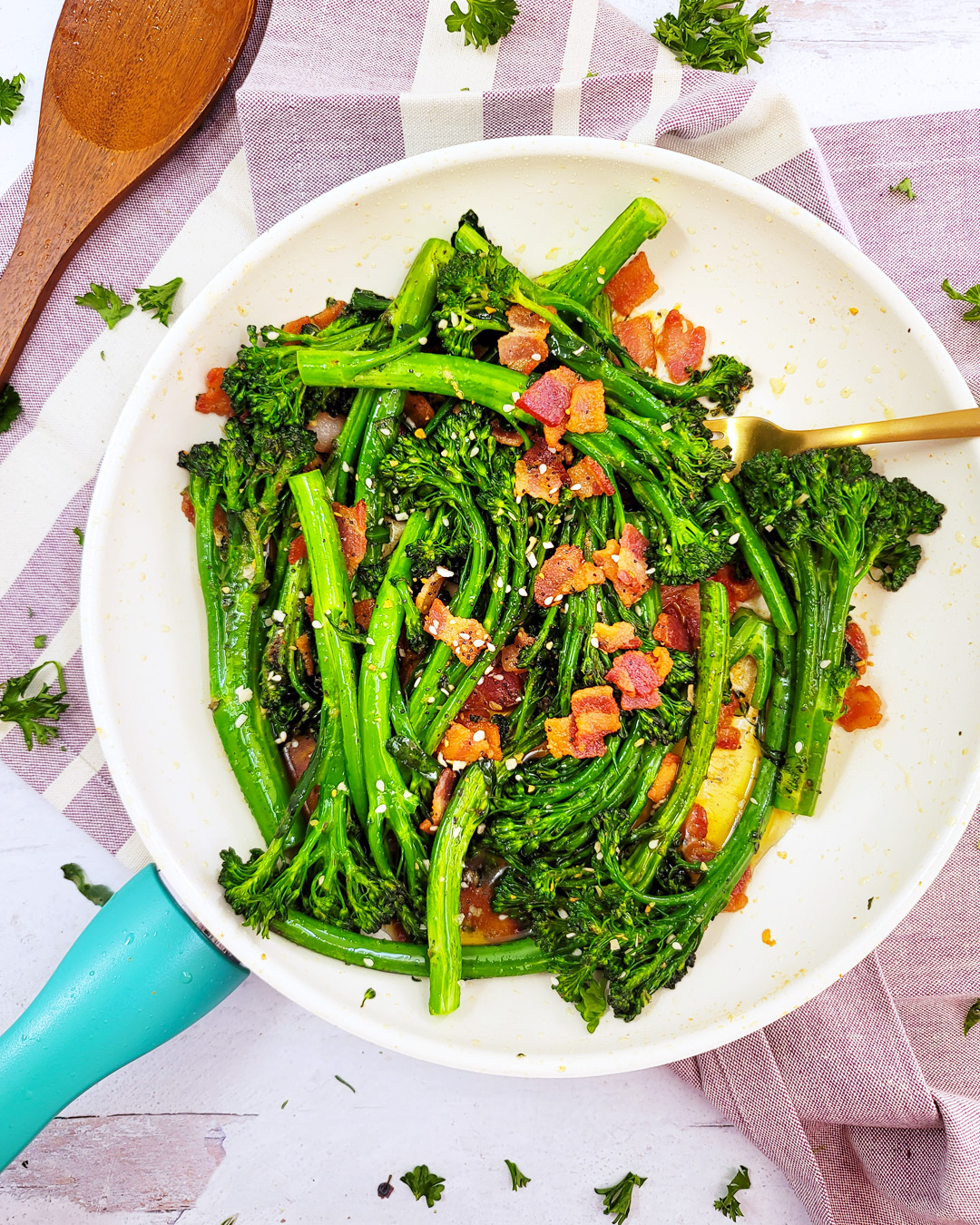 This Garlicky Sautéed Broccolette or Broccolini with Bacon recipe is simple to make, and a delicious accompaniment to any holiday menu. littleeatsandthings.com