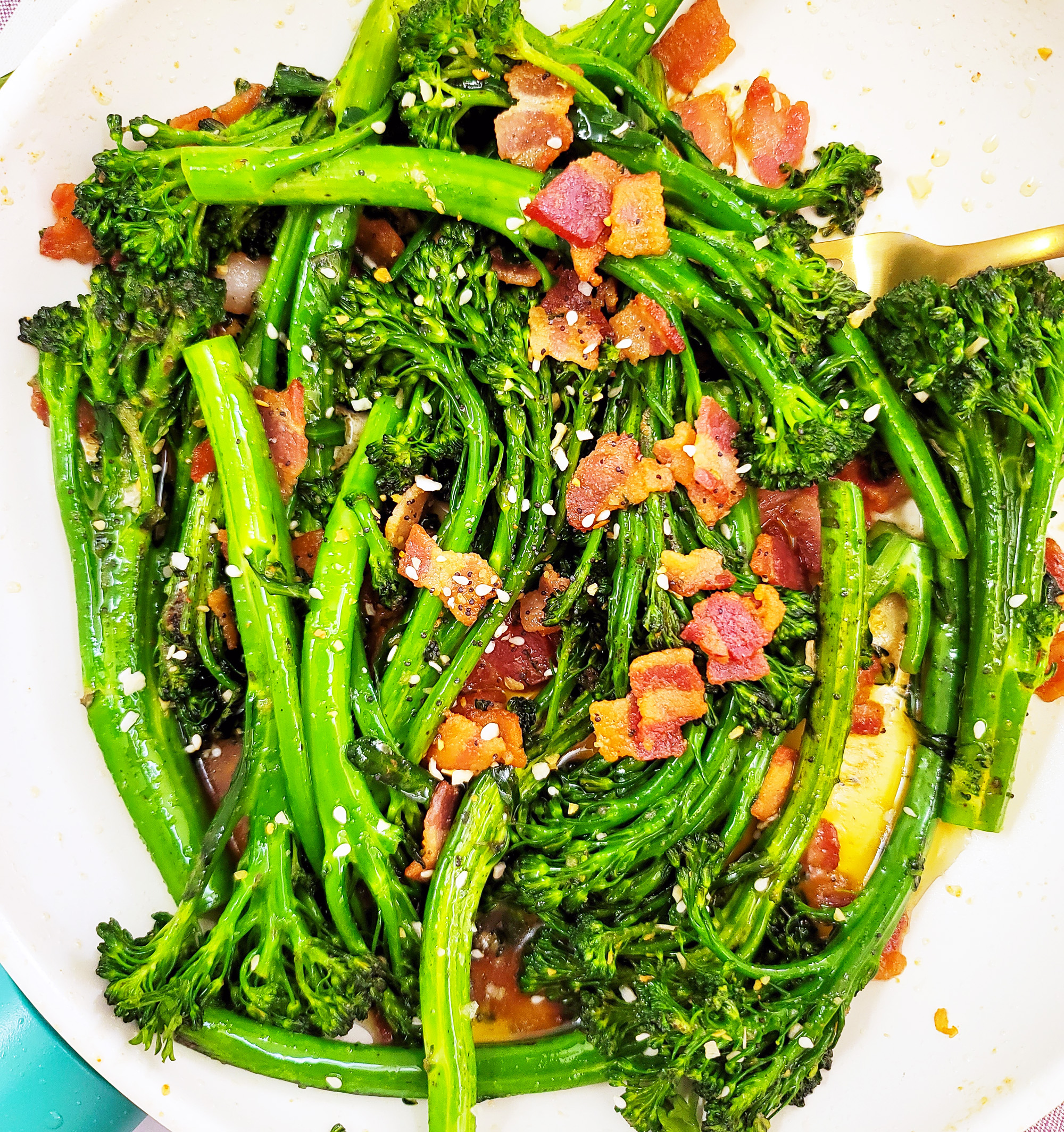 This Garlicky Sautéed Broccolette or Broccolini with Bacon recipe is simple to make, and a delicious accompaniment to any holiday menu. littleeatsandthings.com