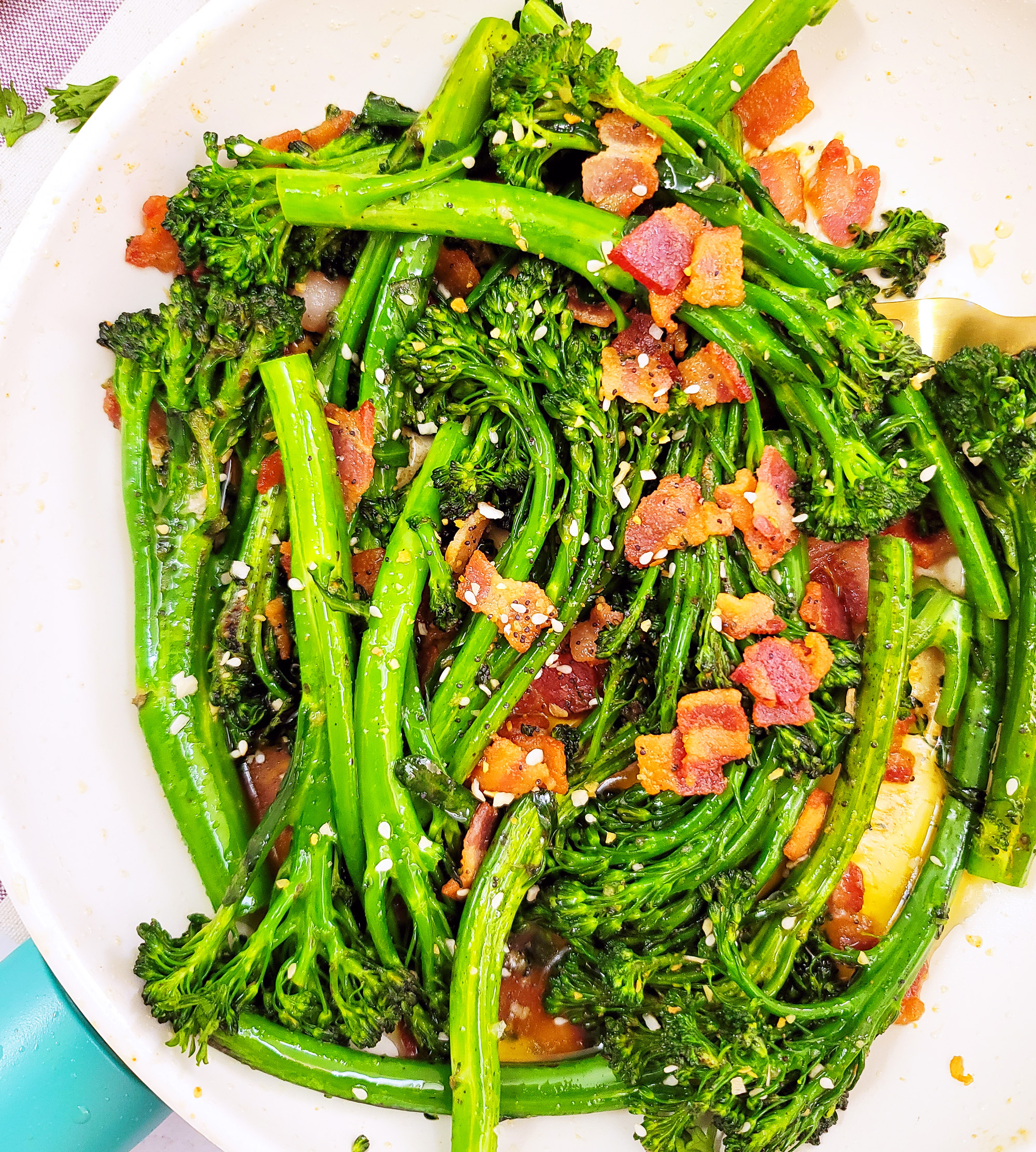 This Garlicky Sautéed Broccolette or Broccolini with Bacon recipe is simple to make, and a delicious accompaniment to any holiday menu. littleeatsandthings.com