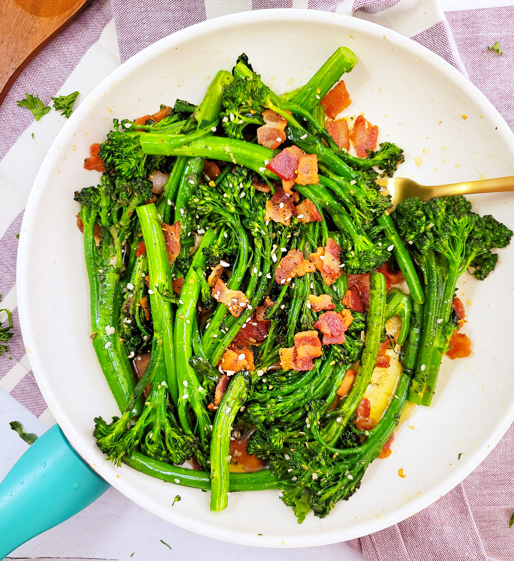 This Garlicky Sautéed Broccolette or Broccolini with Bacon recipe is simple to make, and a delicious accompaniment to any holiday menu. littleeatsandthings.com