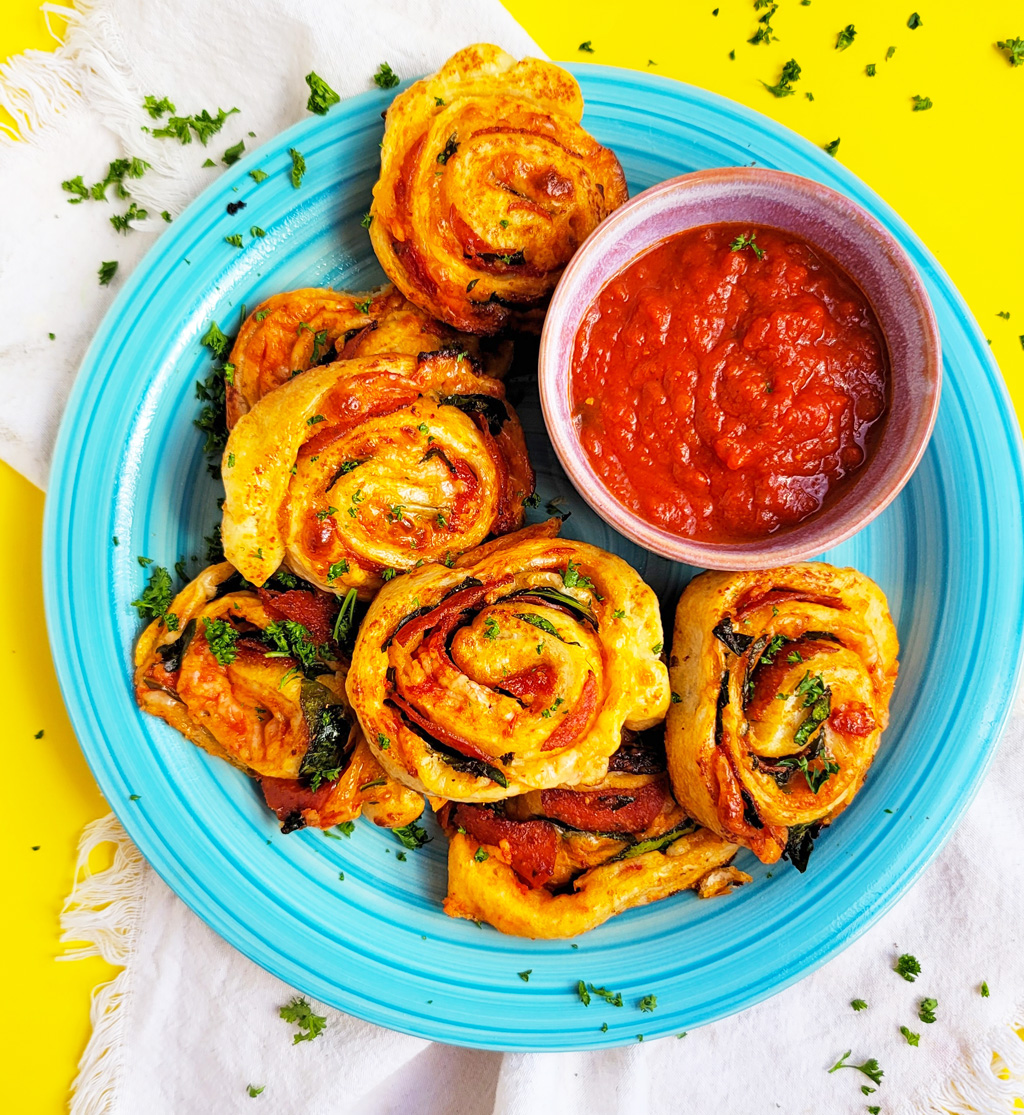 These Spinach & Pepperoni Pizza Rolls are filled with so much flavor and cheesy goodness; made with premade pizza dough. beautifuleatsandthings.com