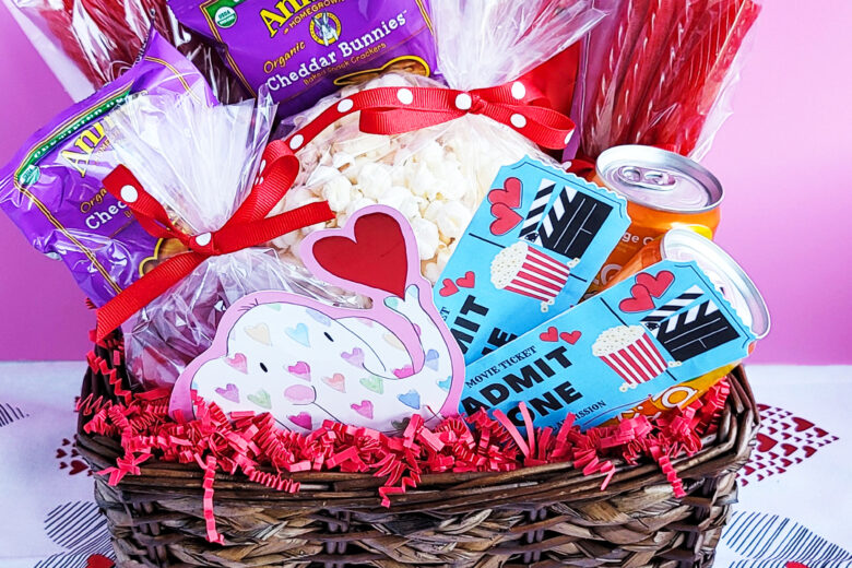 Surprise the kids with this exciting Movie Themed Valentine’s Day Basket! This basket contains popcorn, candy, and a Free DIY Printable for Movie Tickets. littleeatsandthings.com