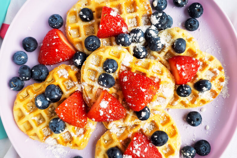 These Berry Yummy Mini Heart Waffles make the perfect Valentine’s Day breakfast! So light and airy… and topped with delicious blueberries and strawberries.