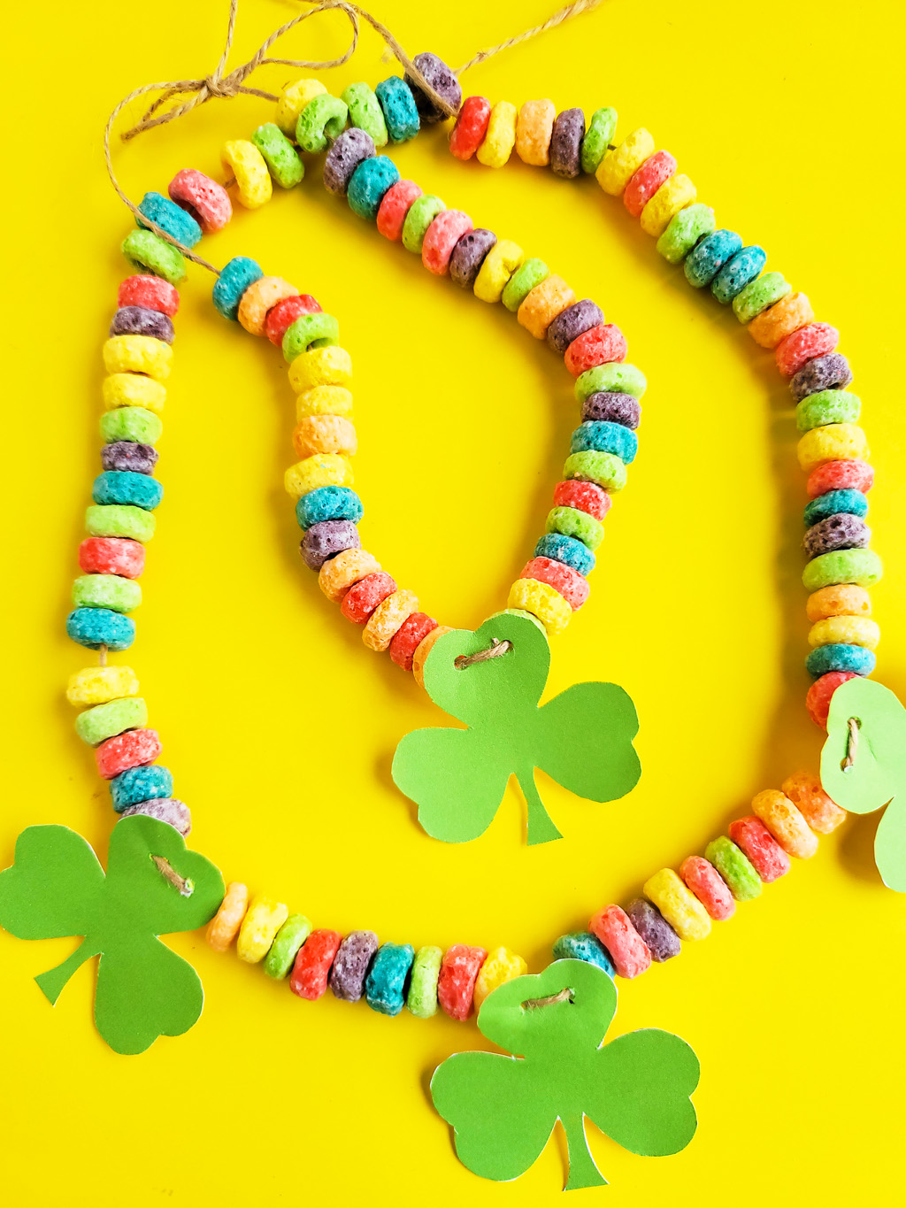 I’ve got you covered with this simple, fun craft: DIY St. Patrick's Day Shamrock Necklace made with fruit loops!  Plus FREE St. Patrick's Day printables.  beautifuleatsandthings.com