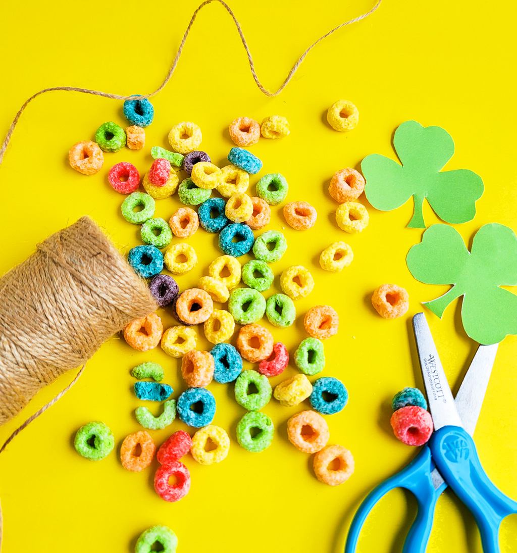 I’ve got you covered with this simple, fun craft: DIY St. Patrick's Day Shamrock Necklace made with fruit loops!  Plus FREE St. Patrick's Day printables.  beautifuleatsandthings.com