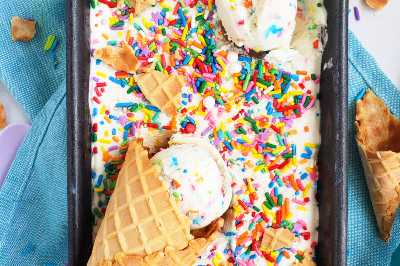 Beat the heat with this delicious, cool No Churn Confetti Ice Cream. Funfetti No Churn Ice Cream made with 3 ingredients in a loaf pan with sprinkles on top. littleeatsandthings.com