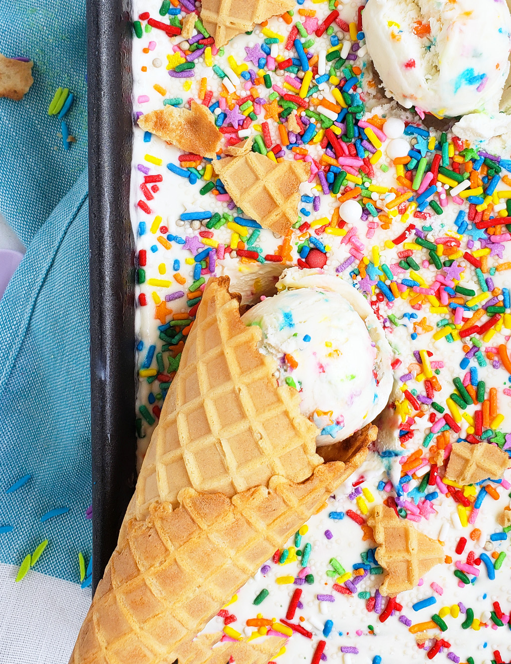 Beat the heat with this delicious, cool No Churn Confetti Ice Cream. Funfetti No Churn Ice Cream made with 3 ingredients in a loaf pan with sprinkles on top. littleeatsandthings.com 