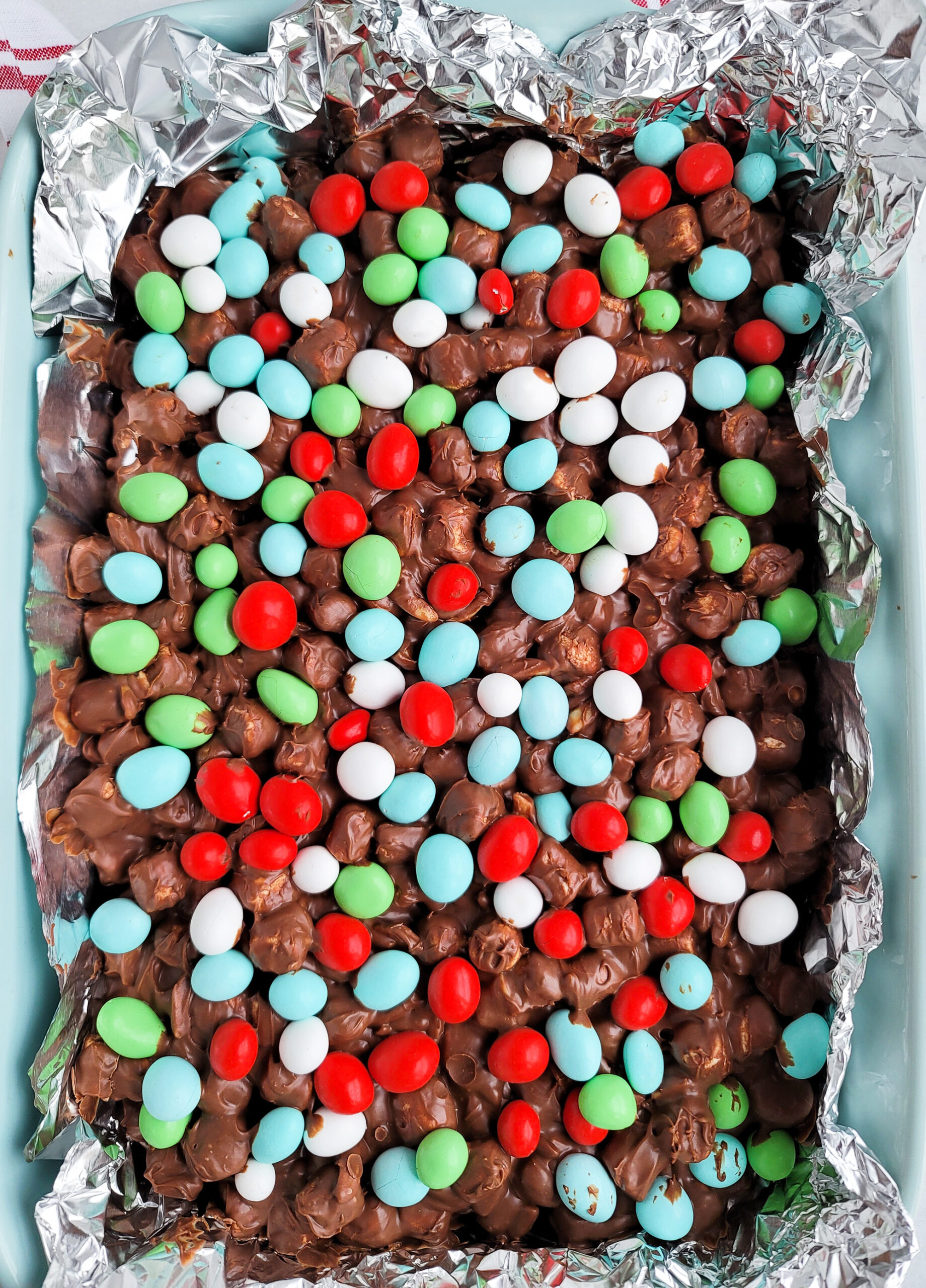 Almond Christmas Dream Bars made Christmas colored chocolates candies  littleeatsandthings.com