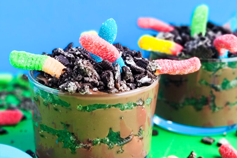 Dirt & Worm Pudding Parfaits for Earth Day, made with chocolate pudding, Oreo cookies, and gummy worms littleeatsandthings.com