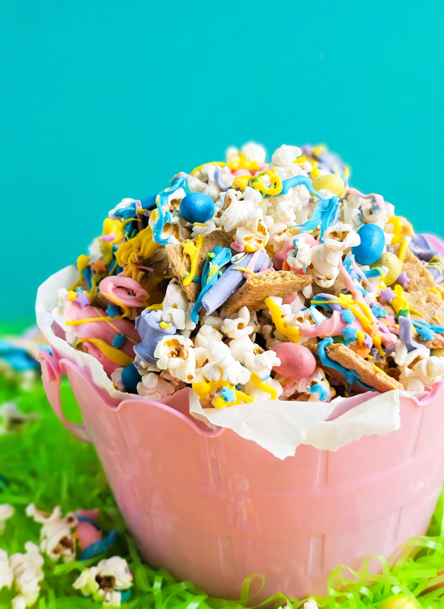 Easy Easter Popcorn with White Chocolate & Mini Eggs, purple, yellow, pink, and blue white chocolate beautifuleatsandthings.com