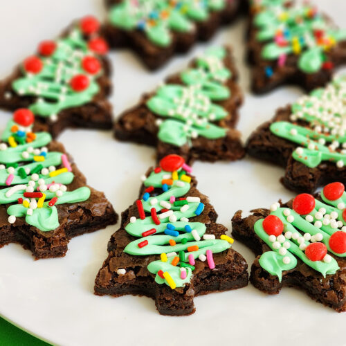 Easy Christmas Tree Brownies, decorated on a white plate littleeatsandthings.com